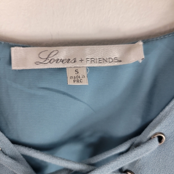 Lovers + Friends Boulevard Lace Up Split Flutter Sleeve Ruffle Peplum Flowy Top - Picture 9 of 12